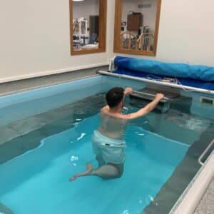 person in aquatic therapy session
